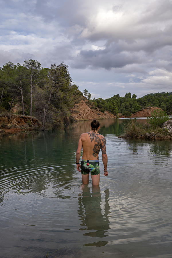 Men Fishing Near A Lake In Underwear Photograph by Cavan Images - Fine Art  America