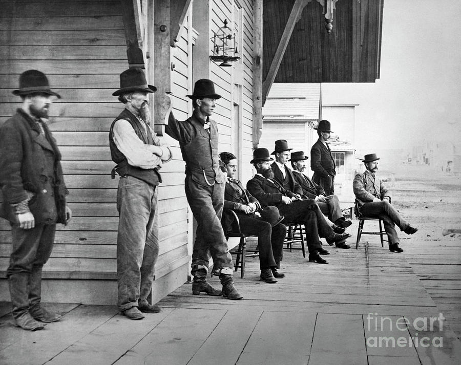 Men Gathered On Porch Photograph by Bettmann