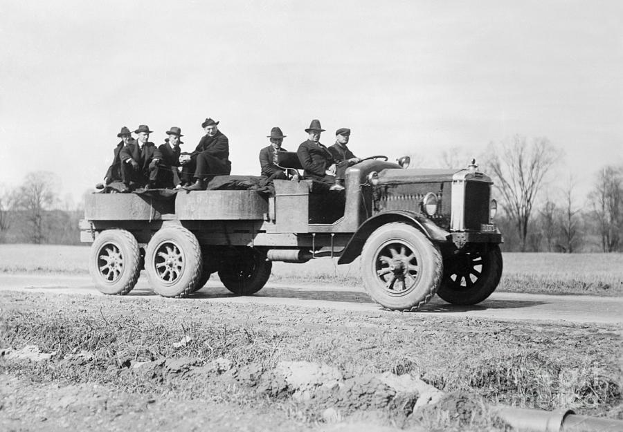 Men Giving Multiple Wheel Truck Road Photograph by Bettmann