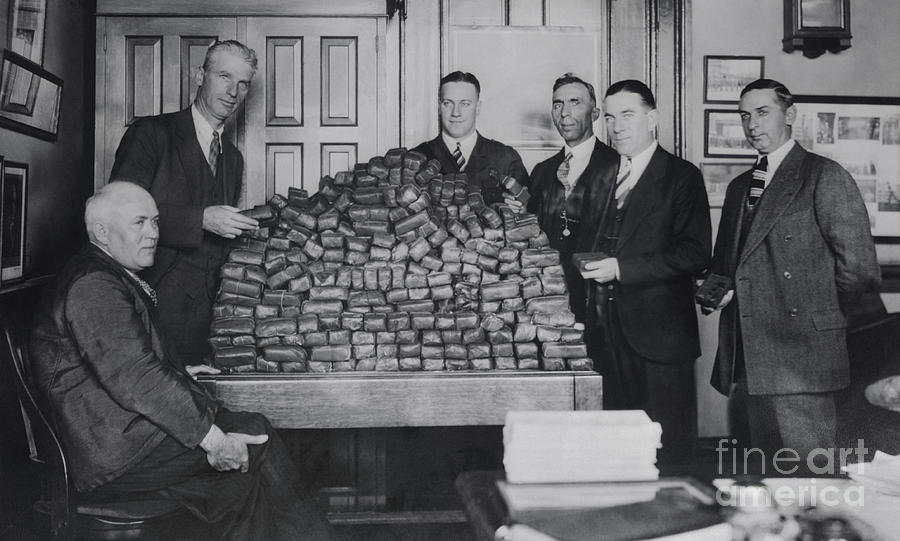 Men Posing With Pile Of Confiscated Photograph by Bettmann