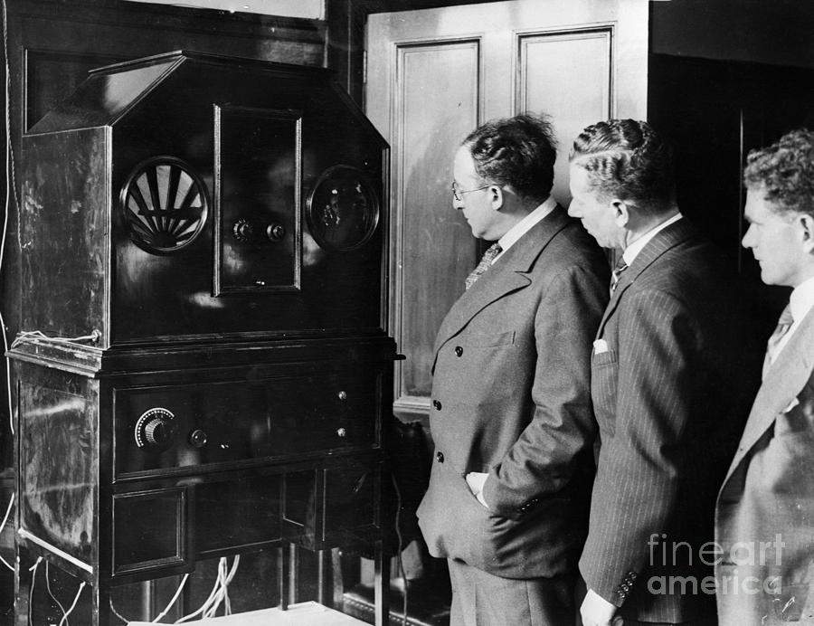 Men Stand By Machine For Receiving Tv by Bettmann