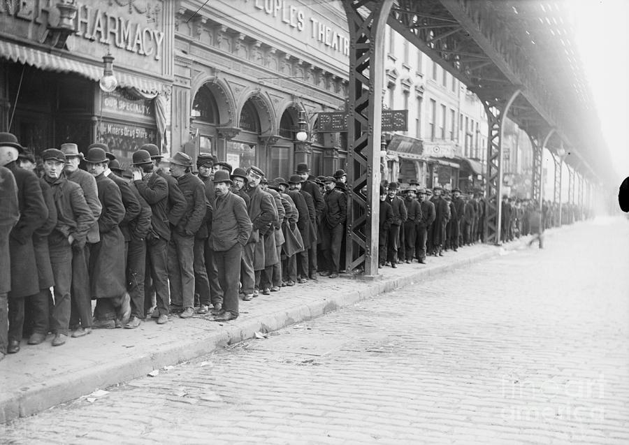 Men Standing In Bread Line Photograph by Bettmann