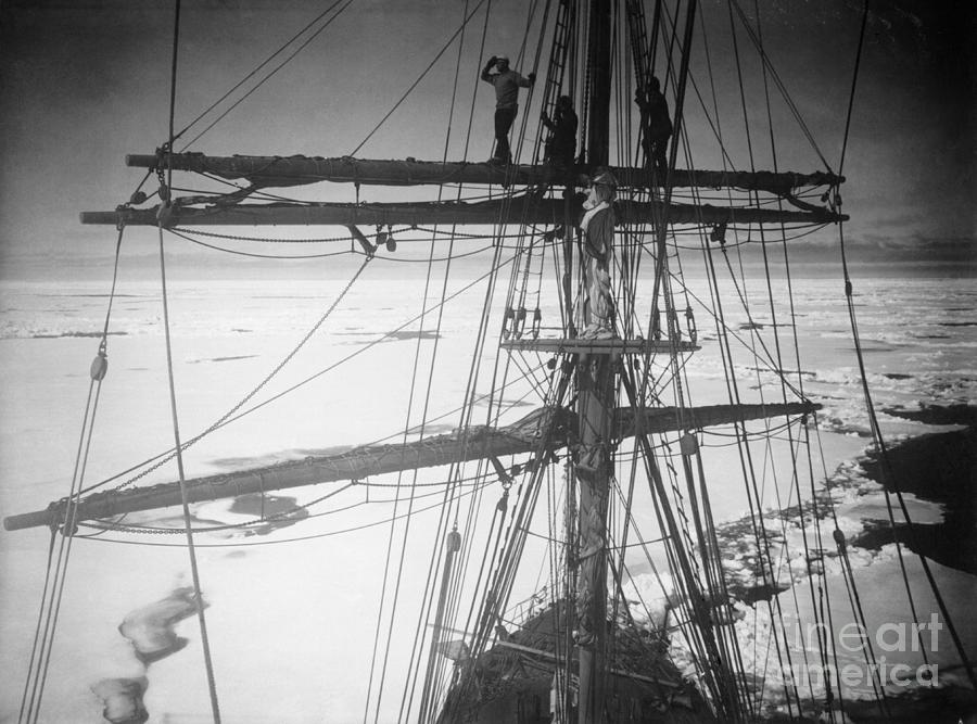 Men Standing On Masts Photograph by Bettmann