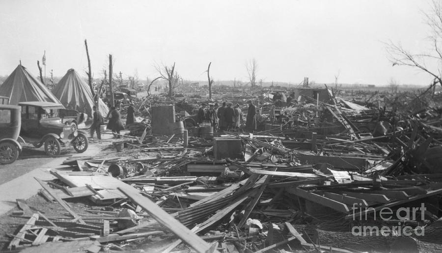 Men Survey Damage Done By Tornado Photograph by Bettmann