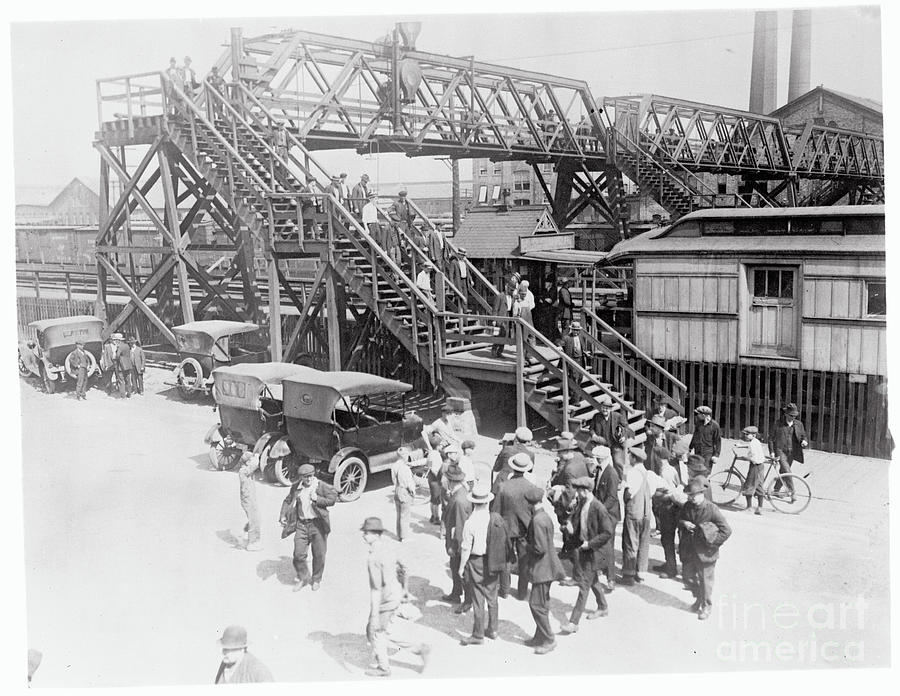Men Walking Out Of Railway Yards Photograph by Bettmann