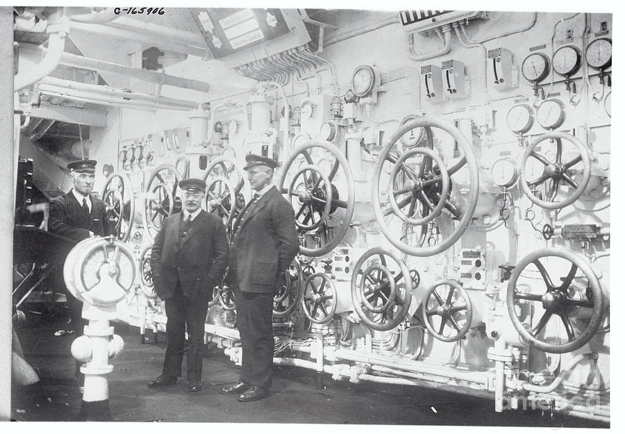 Men Working In Control Room Photograph by Bettmann