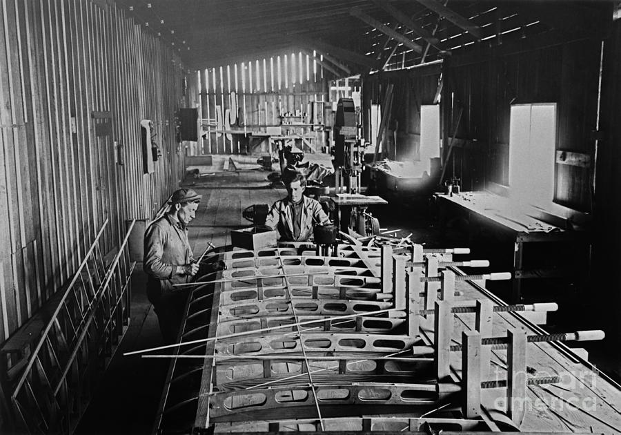 Men Working In Military Aircraft Plant Photograph by Bettmann