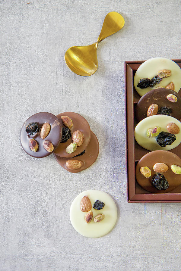 Mendiants With Dried Fruits, Almonds And Pistachios Photograph by Patricia Miceli