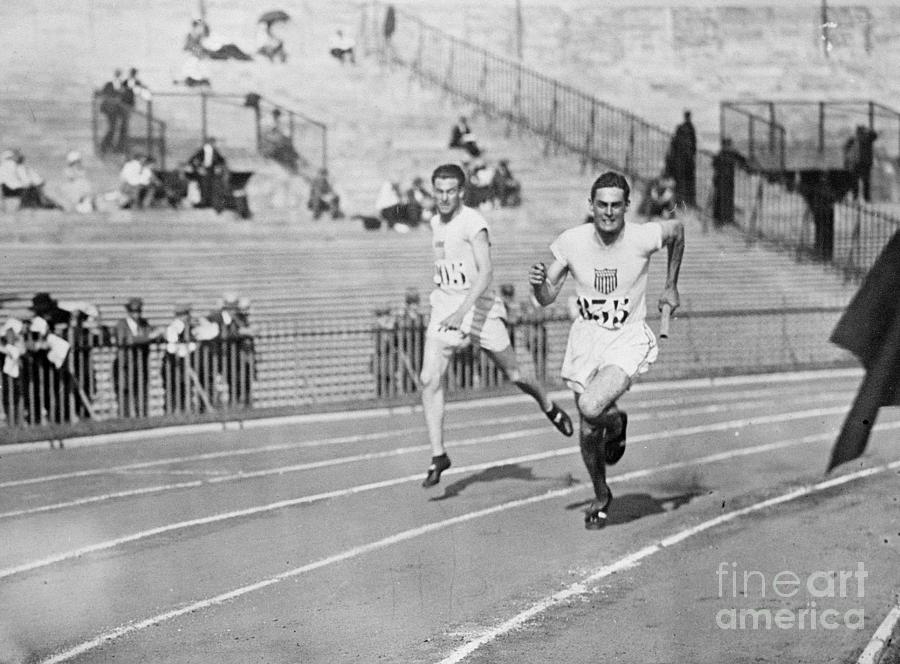 Mens Olympic Relay Team In Action Photograph by Bettmann