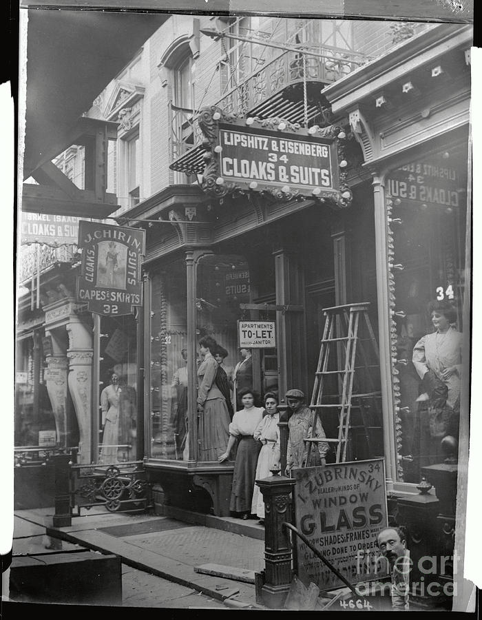 Merchants Standing In Front Of Stores Photograph by Bettmann