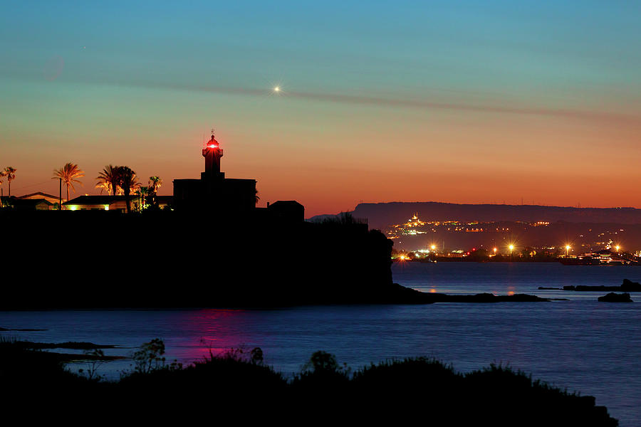 Mercury Twilight Behind The Lighthouse Massolivieri Photograph by Dario