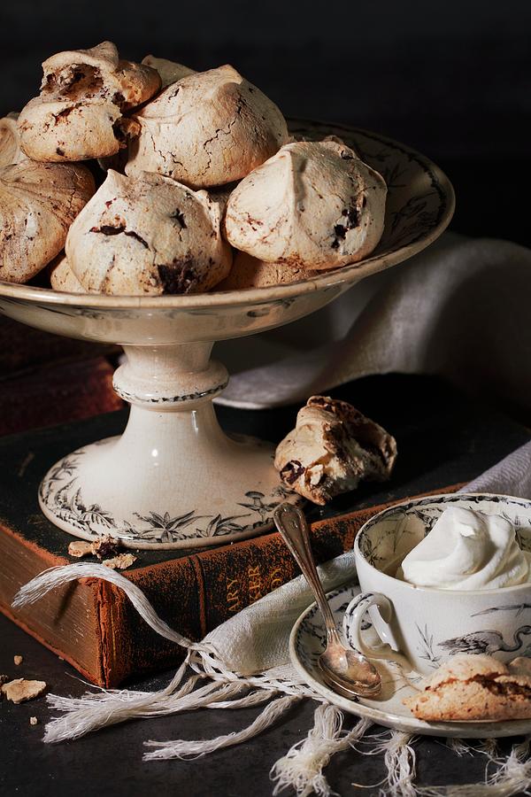 Meringue Biscuits Served With Coffee Photograph by Rose Hodges