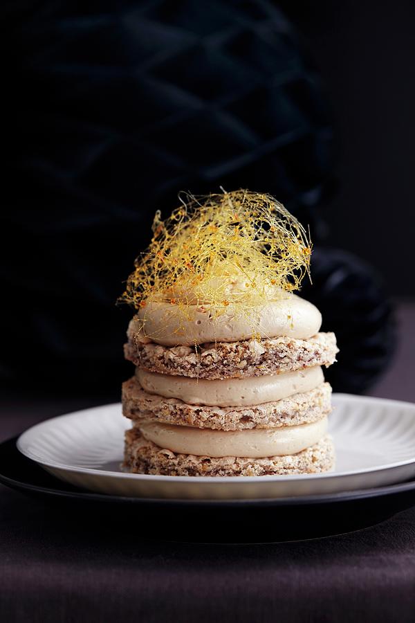 Meringue Cake With Nougat Cream And Caramel Strands For The New Year Photograph by Aina C. Hole