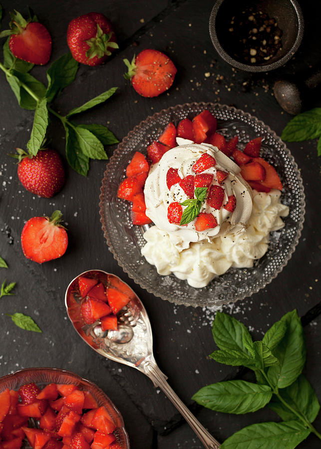Meringue Nest With Cream, Strawberries, Mint And Black Pepper Photograph by Jane Saunders