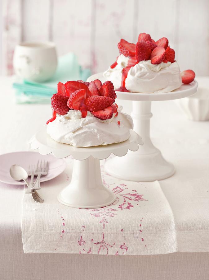 Meringue Nests Filled With Strawberries And Mascarpone Cream Photograph by Jalag / Julia Hoersch