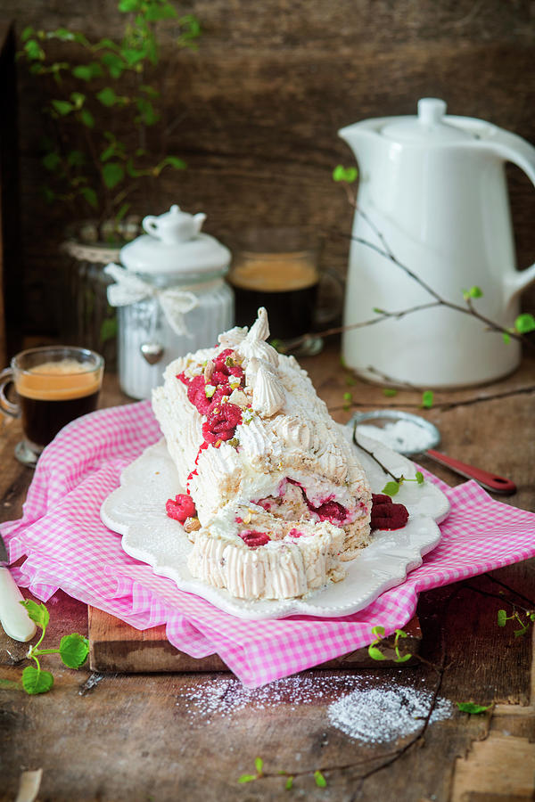 Meringue Roll With Pistachios And Raspberries Photograph by Irina Meliukh