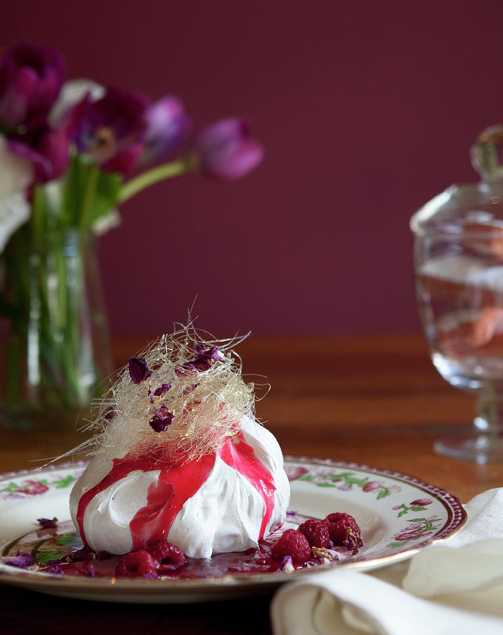 Meringue With Toffee floss Topping, Raspberries And Raspberry Sauce Photograph by Trudy Kelder