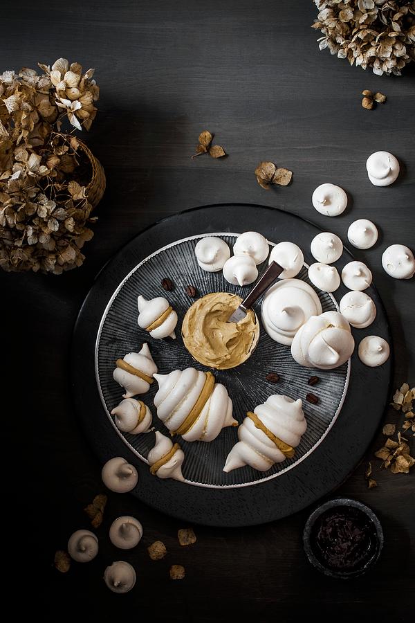 Meringues With Coffee Cream And Dried Flowers Photograph by Magdalena Hendey