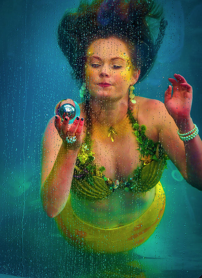 Mermaid Holding Sphere Photograph by Garry Gay
