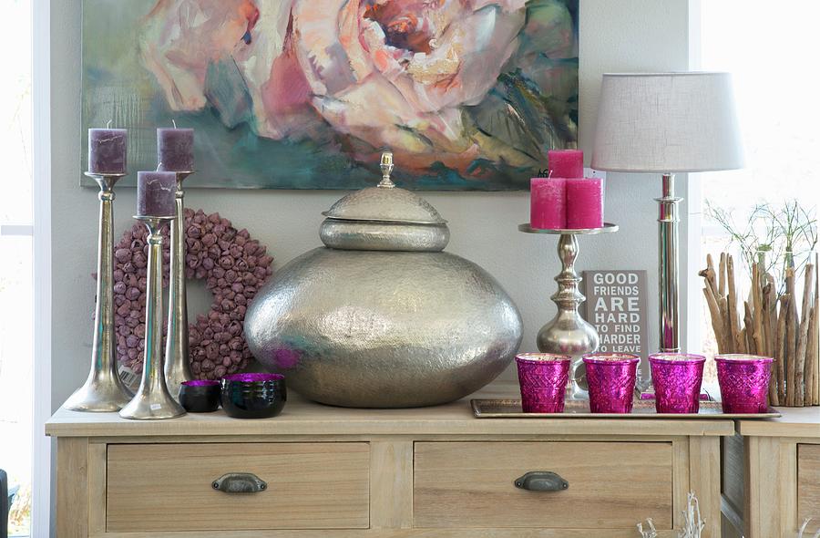 Metal Pot With Lid, Candles In Silver Candlesticks And Tealight Holders On Wooden Lowboy Photograph by Inge Ofenstein