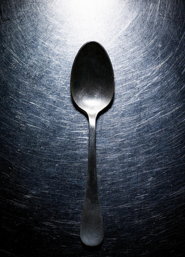 Metal Spoon On Stainless Steel Photograph by Ballyscanlon