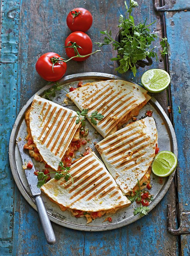 Mexican Chicken Tortillas With Cheese, Pepper And Tomato & Coriander Salsa Photograph by Jalag / Julia Hoersch