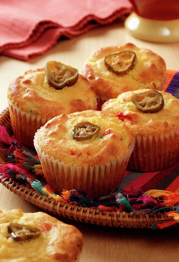 Mexican Corn Bread Muffins On A Multi Coloured Cloth In A Flat Backet ...