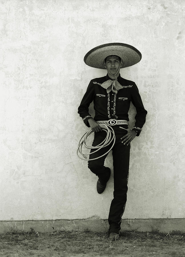 Mexican Cowboy Wearing Hat And Holding by Terry Vine