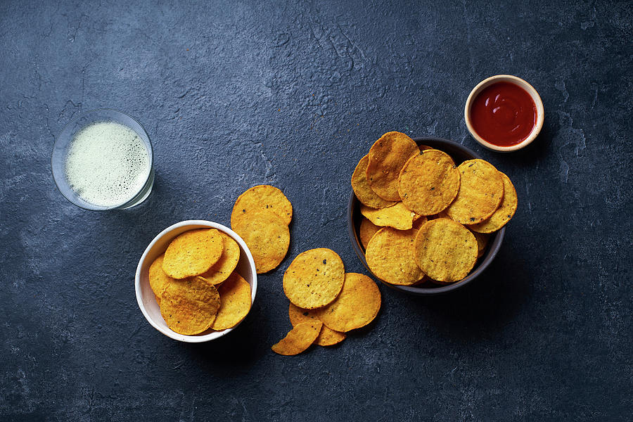 Mexican Round-shaped Nacho Chips In Bowls With Hot Chili Salsa And A Glass Of Beer Photograph by Asya Nurullina