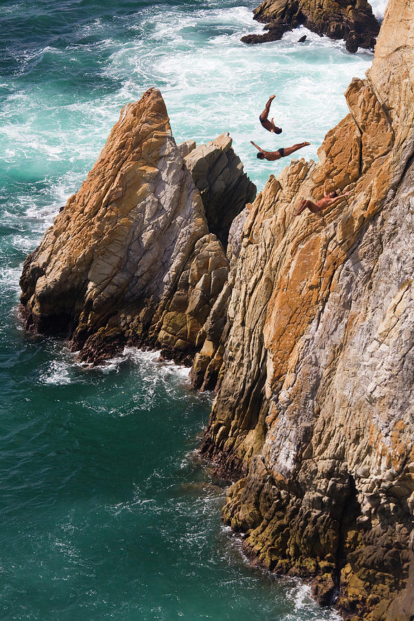 Mexico, Acapulco, Cliff Divers Photograph by Peter Adams
