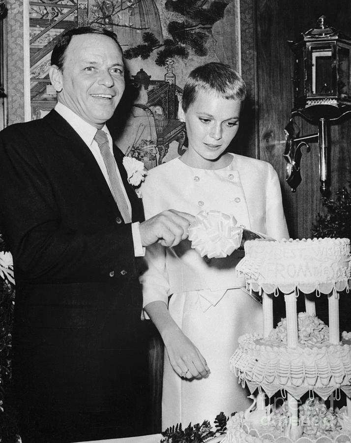 Mia Farrow And Frank Sinatra Cutting Photograph by Bettmann