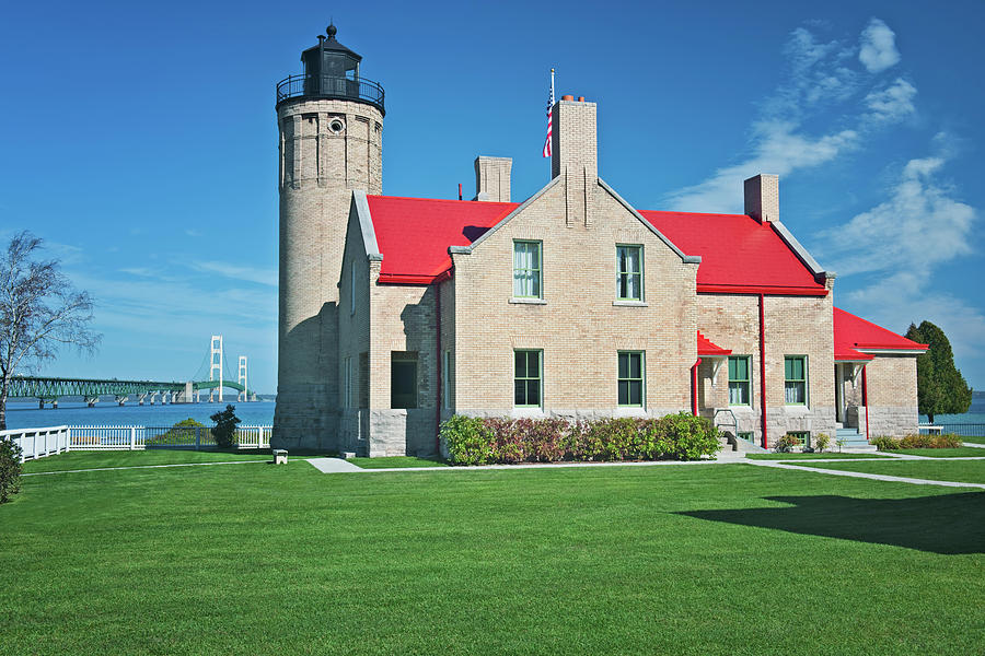 Michigan's Old Mackinac Point Lighthouse with the Mackinac Bridge ...