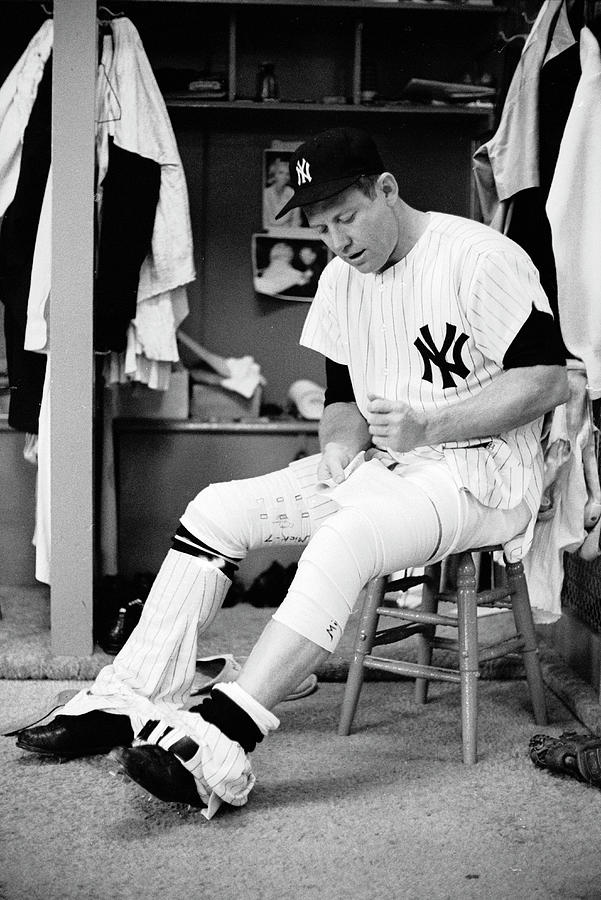 Mickey Mantle Photograph - Mickey Mantle Bandages His Leg by John Dominis