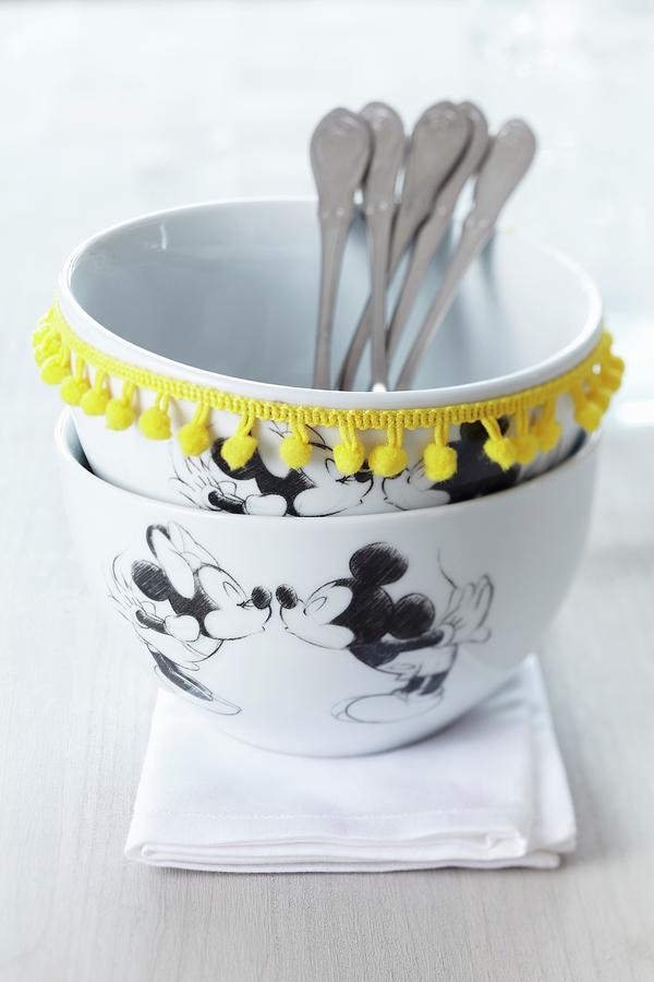 Mickey Mouse Bowls Decorated With Yellow Pompom Trim Photograph by Franziska Taube