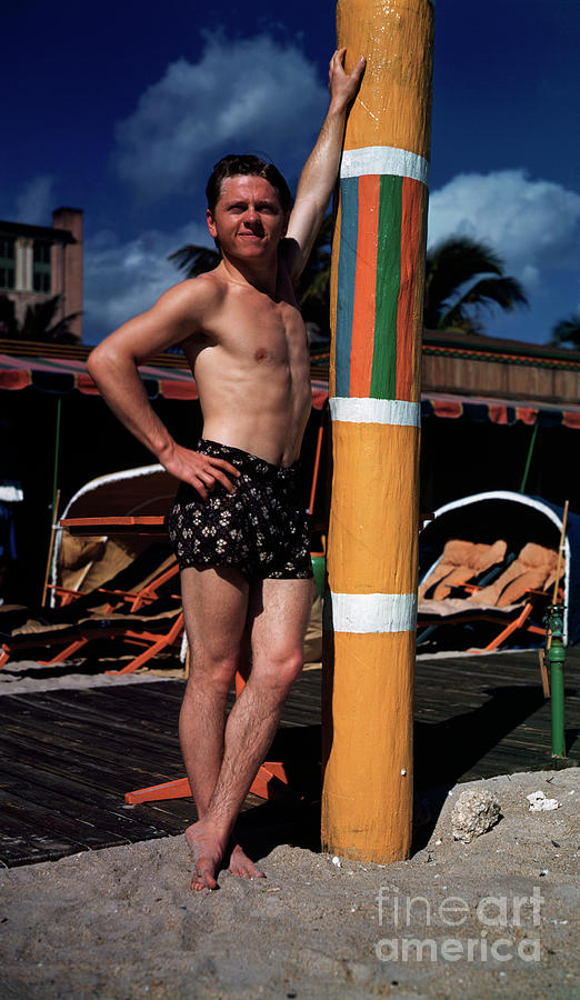 Mickey Rooney Standing In Bathing Trunks Photograph by Bettmann