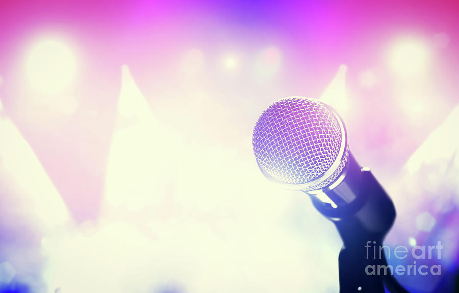 Music Photograph - Microphone and bright colorful stage lights. by Michal Bednarek