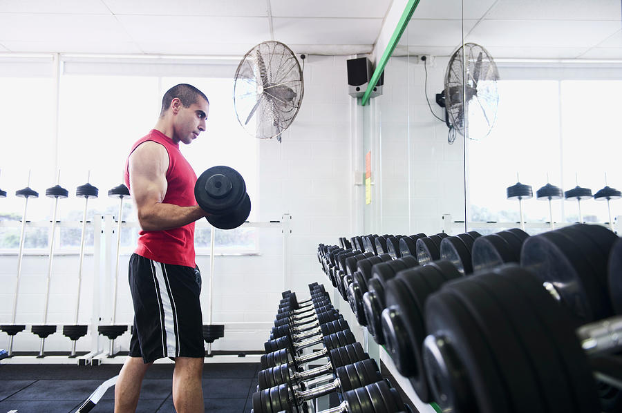 Middle Eastern Man Exercising With Photograph by Jacobs Stock Photography Ltd