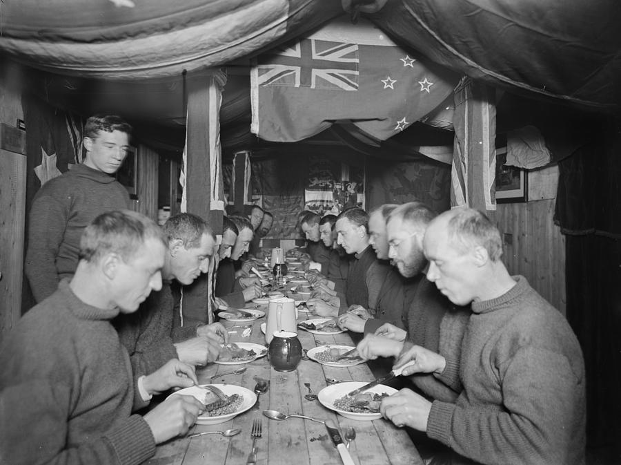 Midwinter Dinner Aboard The Endurance Photograph by Royal Geographical Society