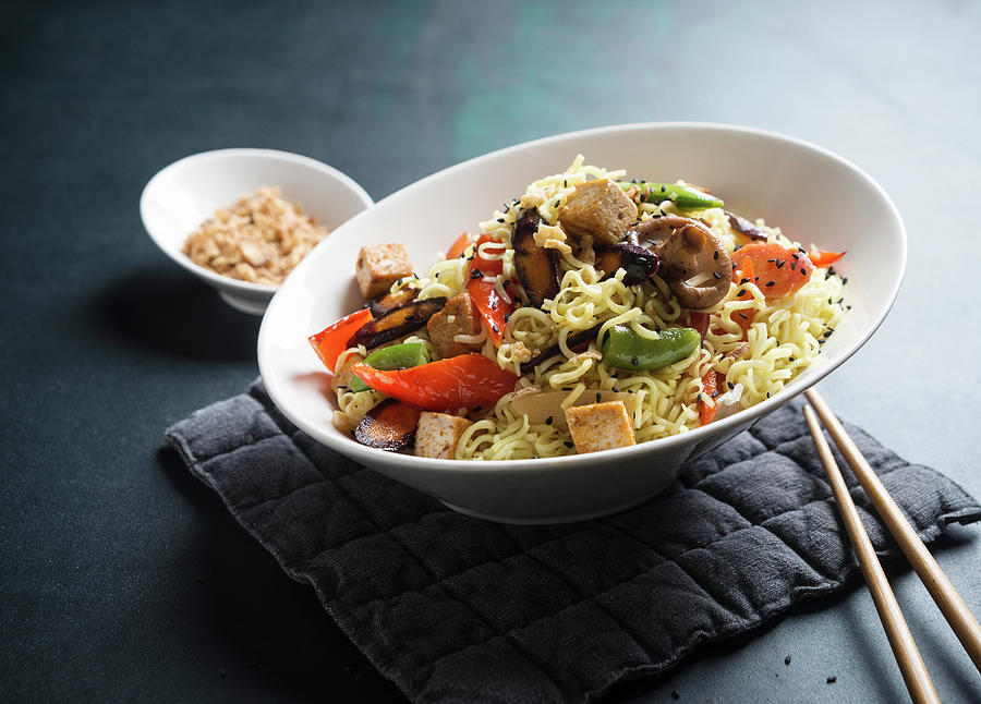 Mie Noodles With Oriental, Stir-fried Vegetables And Tofu, Sesame Seeds And Roasted Onions vegan Photograph by Kati Neudert