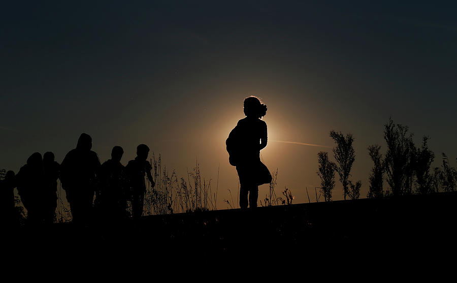 Migrants Walk Along Rail Tracks Photograph by Laszlo Balogh - Fine Art ...