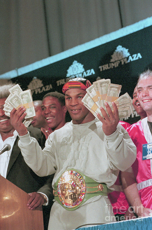 Mike Tyson Holding Money Photograph by Bettmann