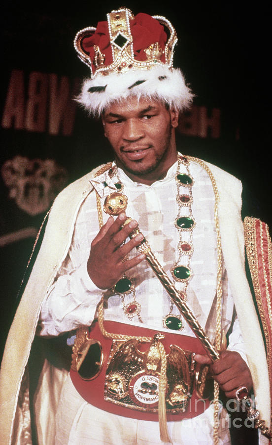 Mike Tyson In Cape And Crown, Holding Photograph by Bettmann