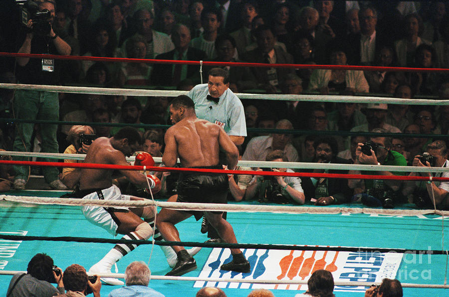 Mike Tyson Punching Michael Spinks Photograph by Bettmann