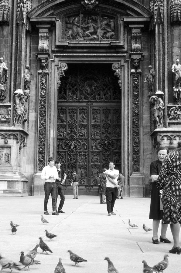 Milan Cathedral doors Photograph by Nigel Radcliffe