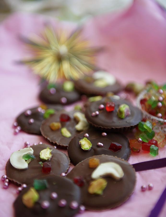 Milk And Dark Chocolates With Nuts, Candied Fruits And Sugar Pearls Photograph by Hannah Kompanik
