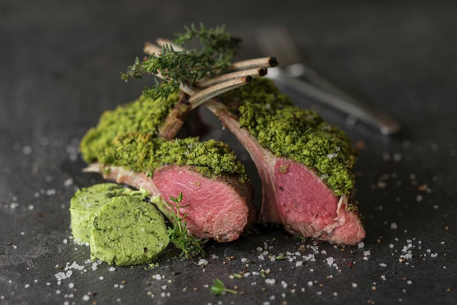 Milk-fed Rack Of Lamb With A Herb Crust And Herb Butter Photograph by Jan Wischnewski