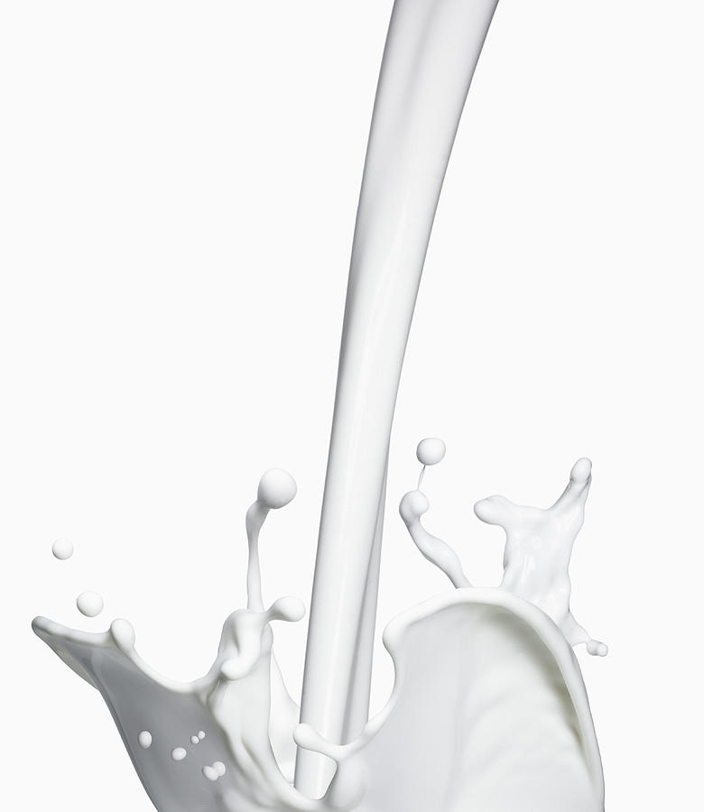 Milk Splashing Photograph by Jack Andersen