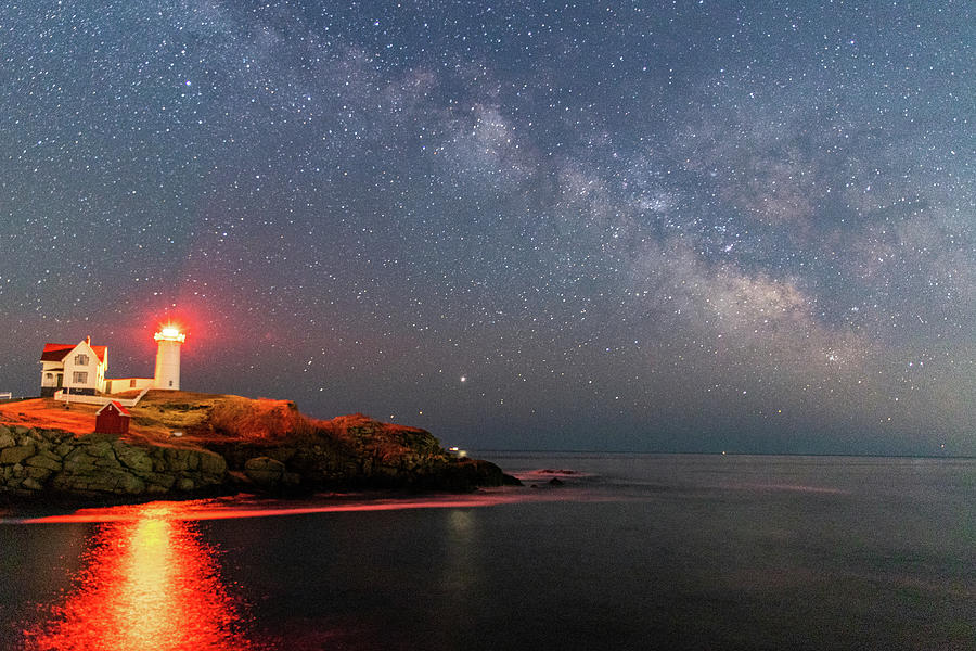 Milkyway Stars Shining Above Lighthouse And Ocean Along Maine Coast ...