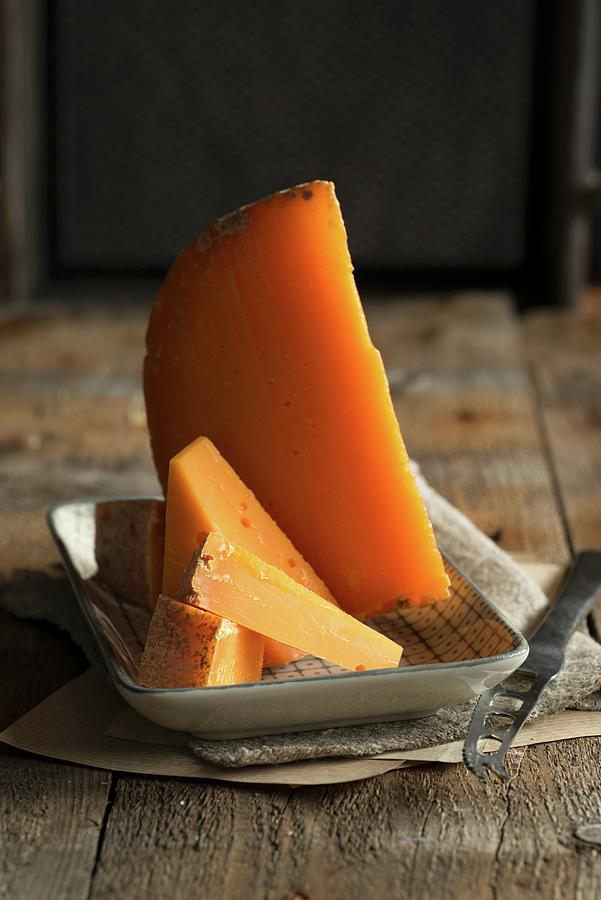 Mimolette Vieille ball-shaped Hard Cheese, France Photograph by Sonia Chatelain