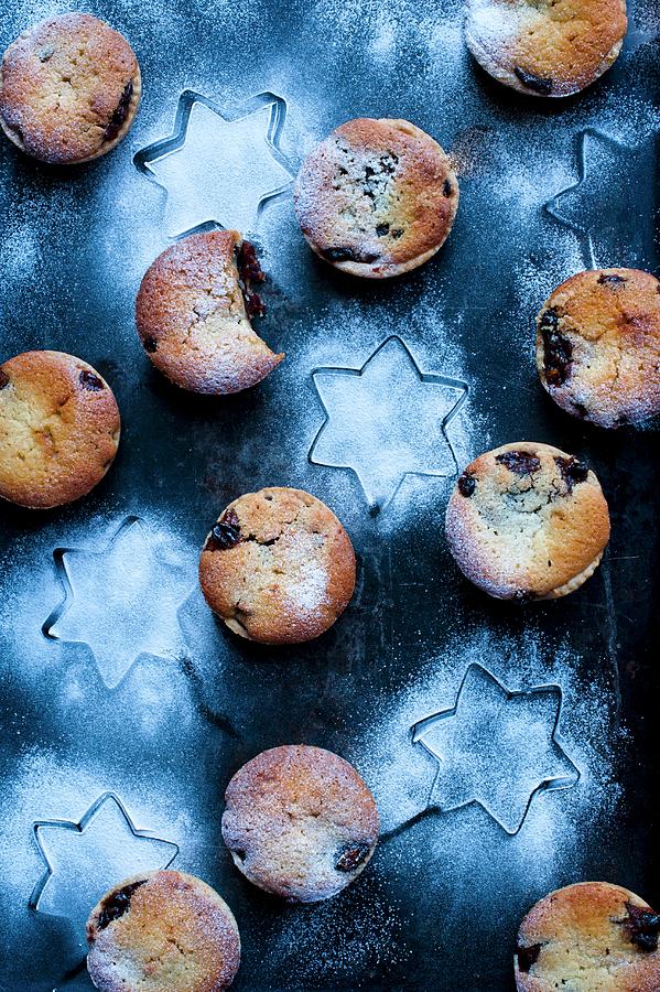 Mince Pies Dusted With Icing Sugar On A Blue Starry Background Photograph by Magdalena Hendey